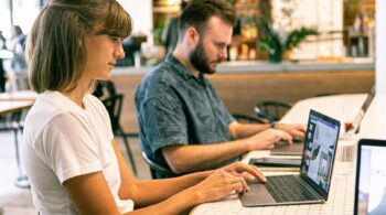 photo of woman using laptop