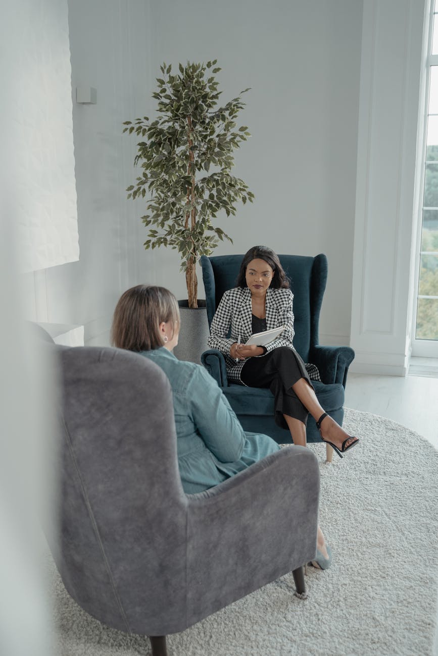 two women sitting down for an interview